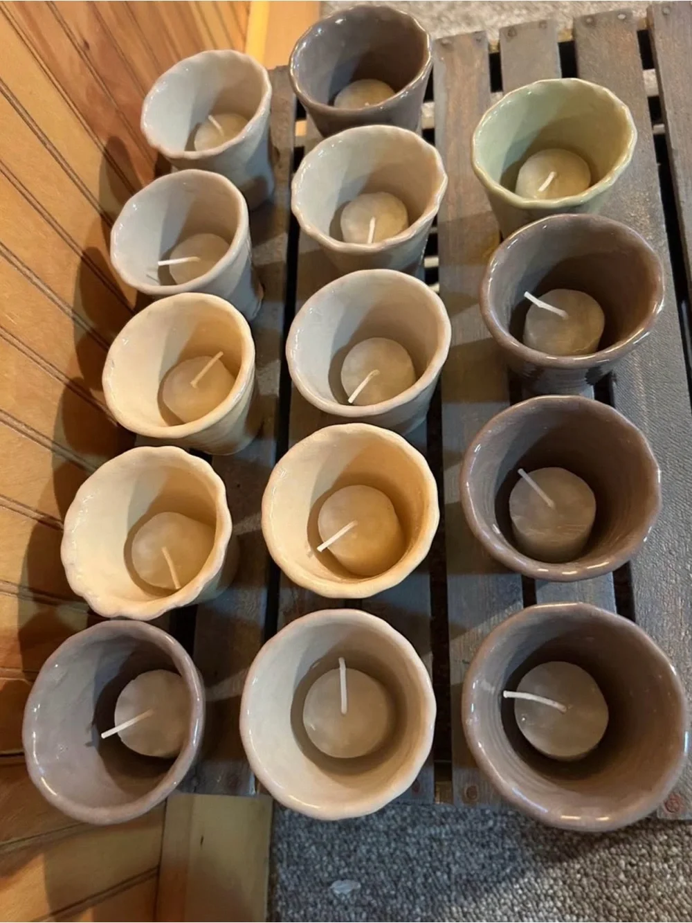 Brand new set of 15 garden votive candles with holders